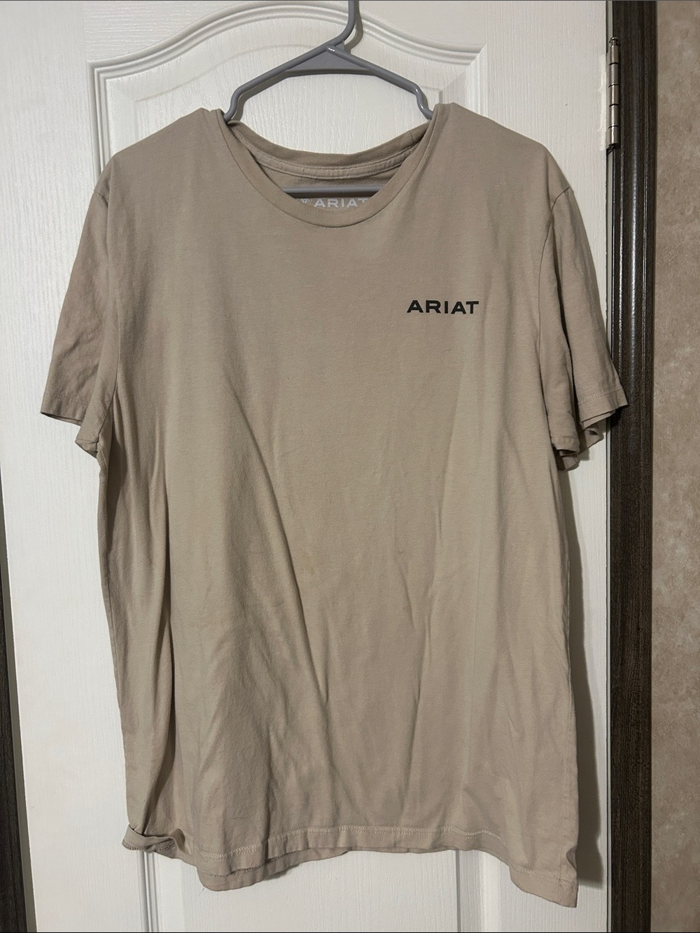 Ariat Men’s Short Sleeve Crew Tee in Tan with Black Logo